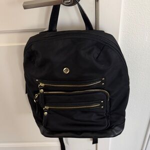 Black Backpack with Gold Accents.. Nylon